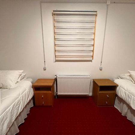 Hostal B&B Coastal Natales Пуэрто-Наталес Экстерьер фото