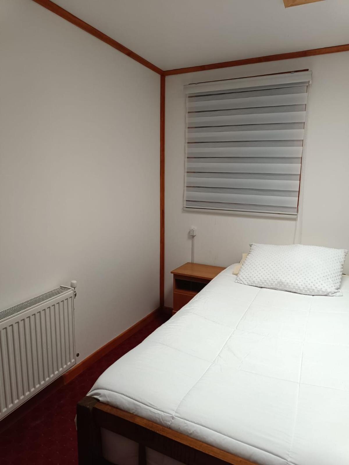 Hostal B&B Coastal Natales Пуэрто-Наталес Экстерьер фото