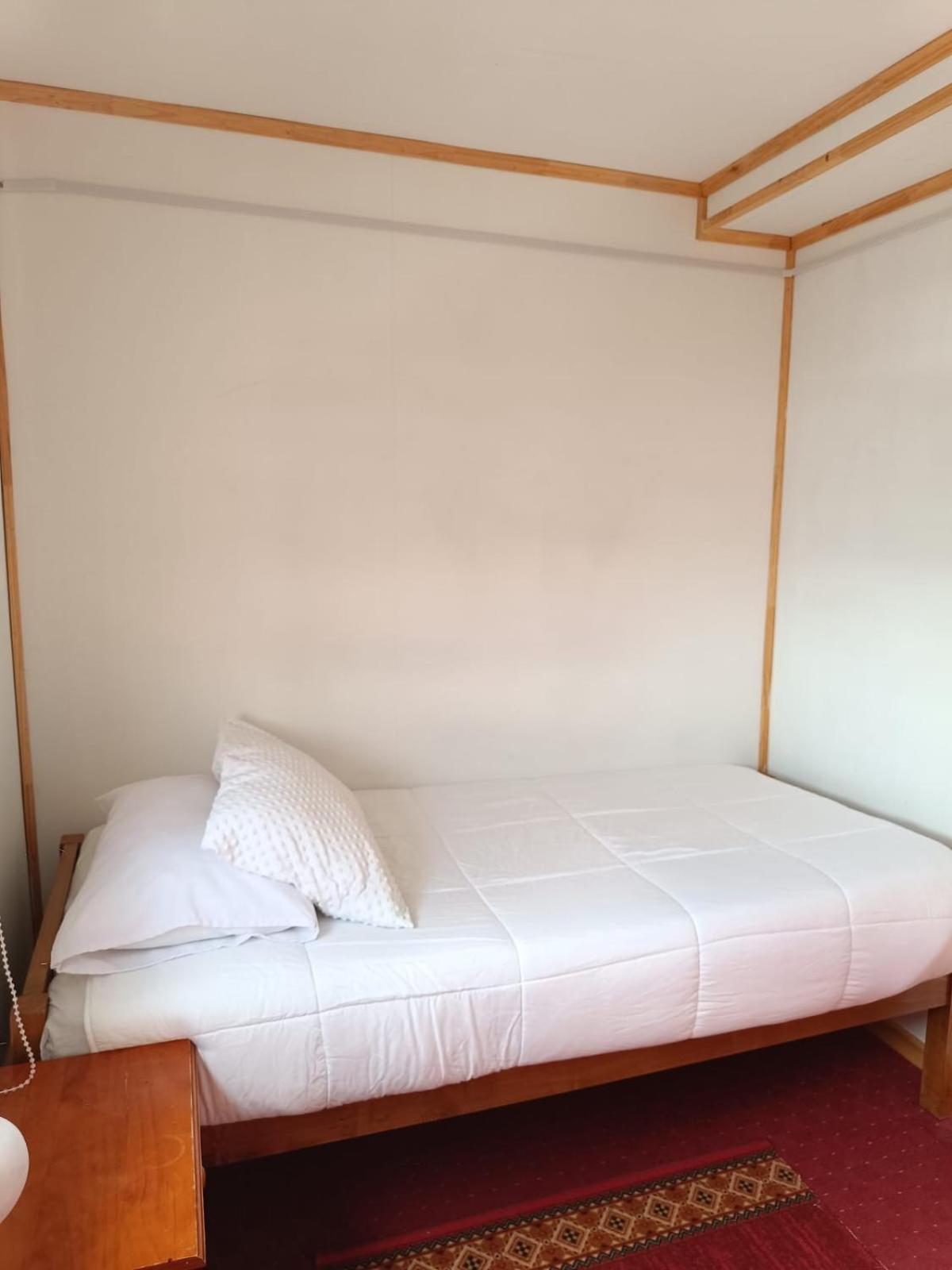 Hostal B&B Coastal Natales Пуэрто-Наталес Экстерьер фото